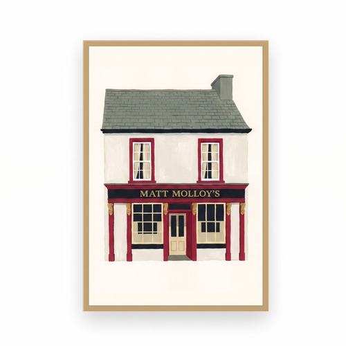 Matt Molloy's Westport pub print in a slim natural oak frame on a plain white background